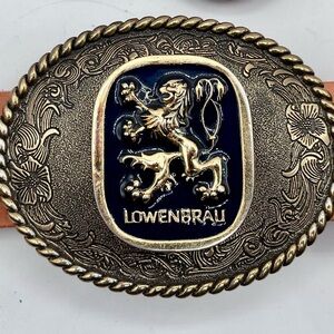 Gold and black " Lowenbrau " majestic lion championship belt buckle